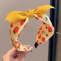 12  yellow bow 