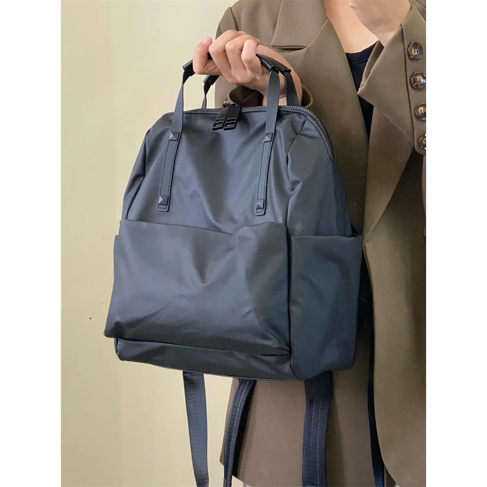 Waterproof Nylon Backpack 2025 New Trendy Travel Backpack Fashionable and Versatile Handheld Lightweight Commuter Backpack