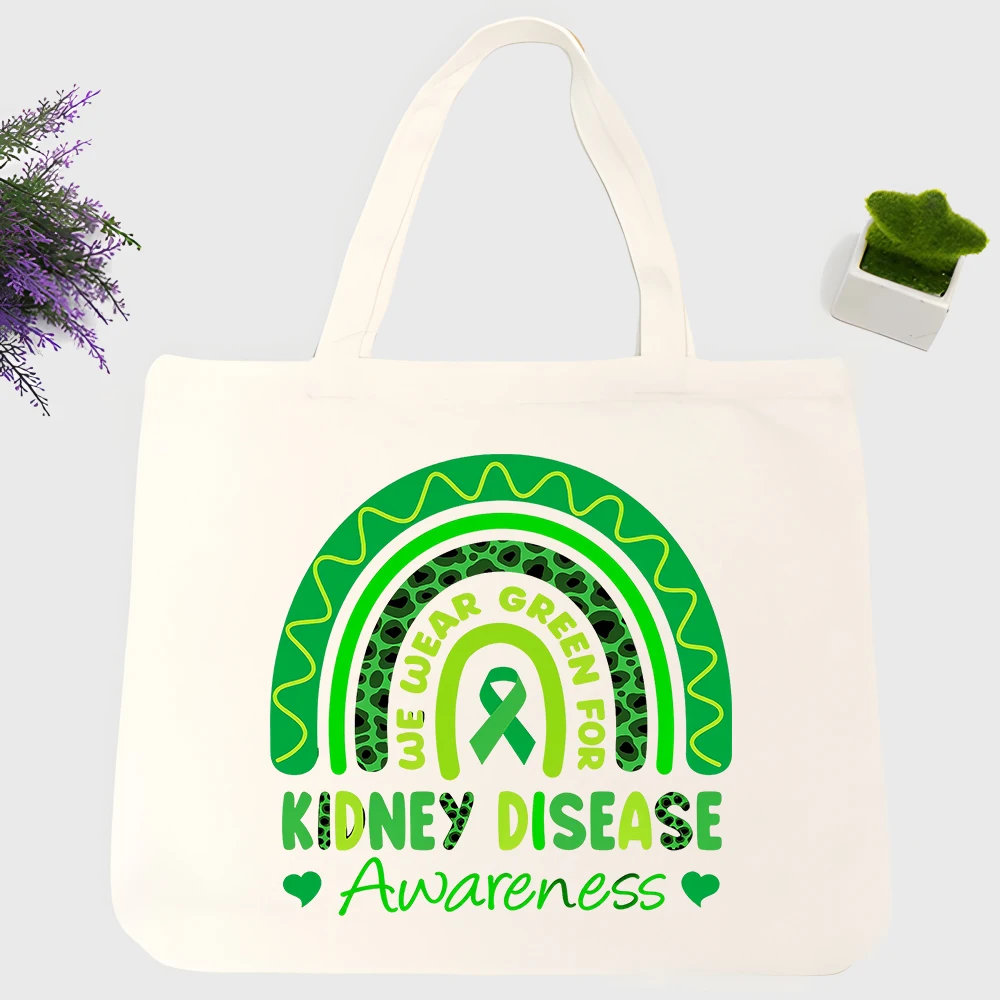 Kidney disease awareness canvas tote bag with green ribbon and rainbow graphic, suitable for daily shopping and casual outings