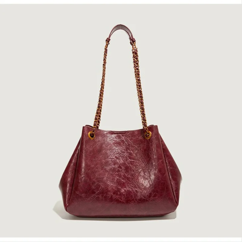 高級レザー製の女性用ショルダーバッグ、パリのカジュアルでエレガントなデイリールックを演出します。 ​