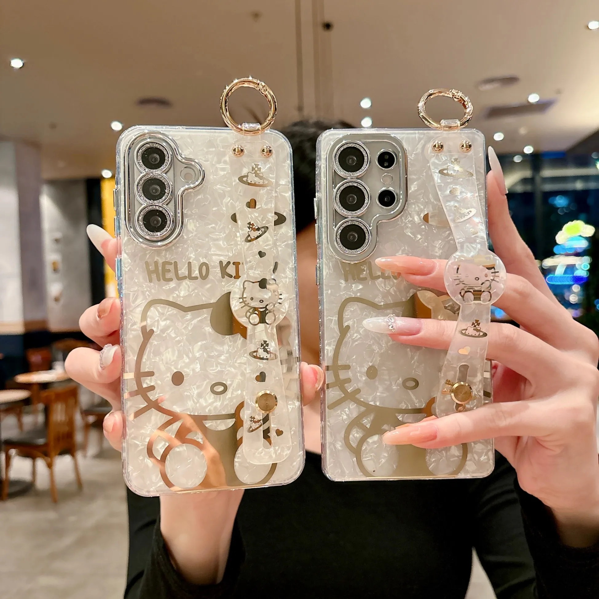 Custodia Trendy Lucida Placcata Sanrio Hello Kitty per Samsung S26 Ultra S25 S24 Plus con Cinturino e Protezione Lente Antiurto