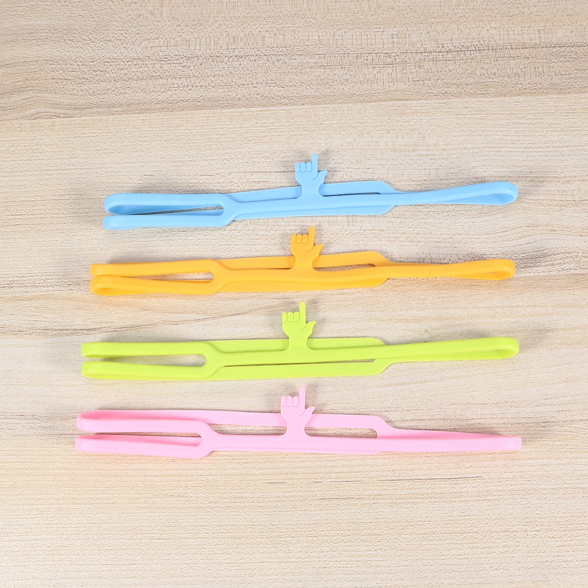 

4Pcs Chic Silicone Finger Bookmarks Fun Page Holder for Students Adults Creative Stationery Gift for Book