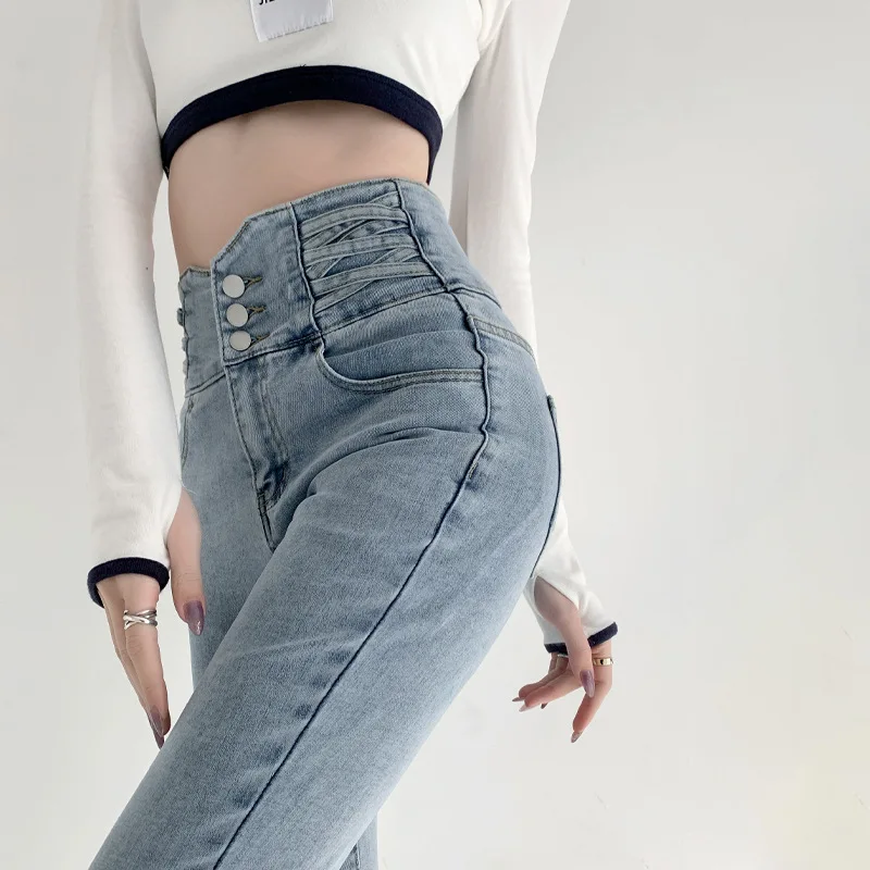 جينز أزرق فاتح للنساء، سروال جينز مطاطي عالي الخصر، بنطلون ضيق، أزرار جينز ضيق
