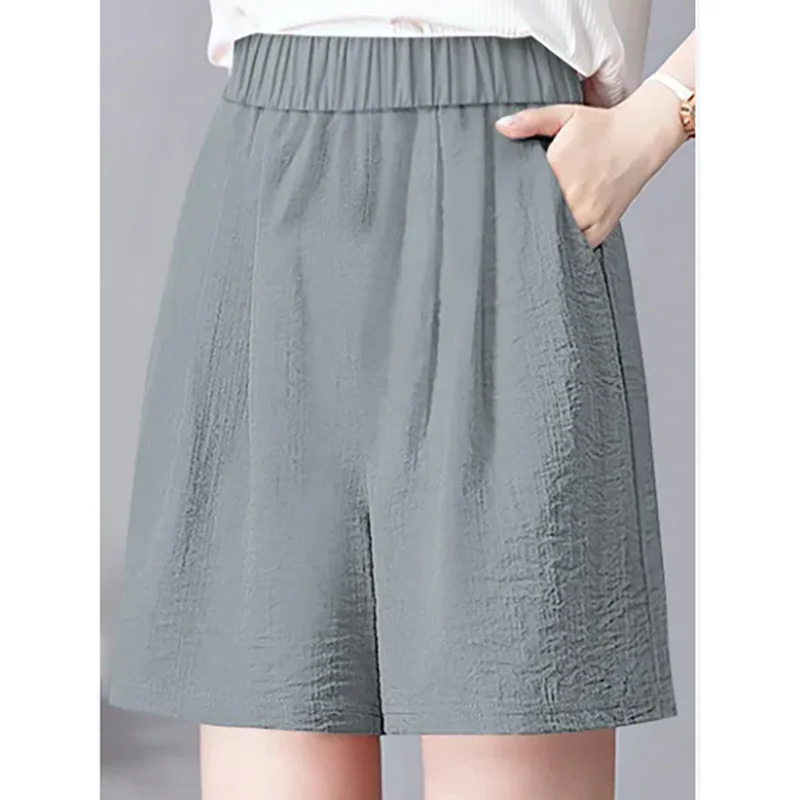 Shorts monocromáticos elásticos femininos com bolsos, shorts de joelho soltos, roupas casuais, cintura alta, tudo combina, nova moda, verão, 2024