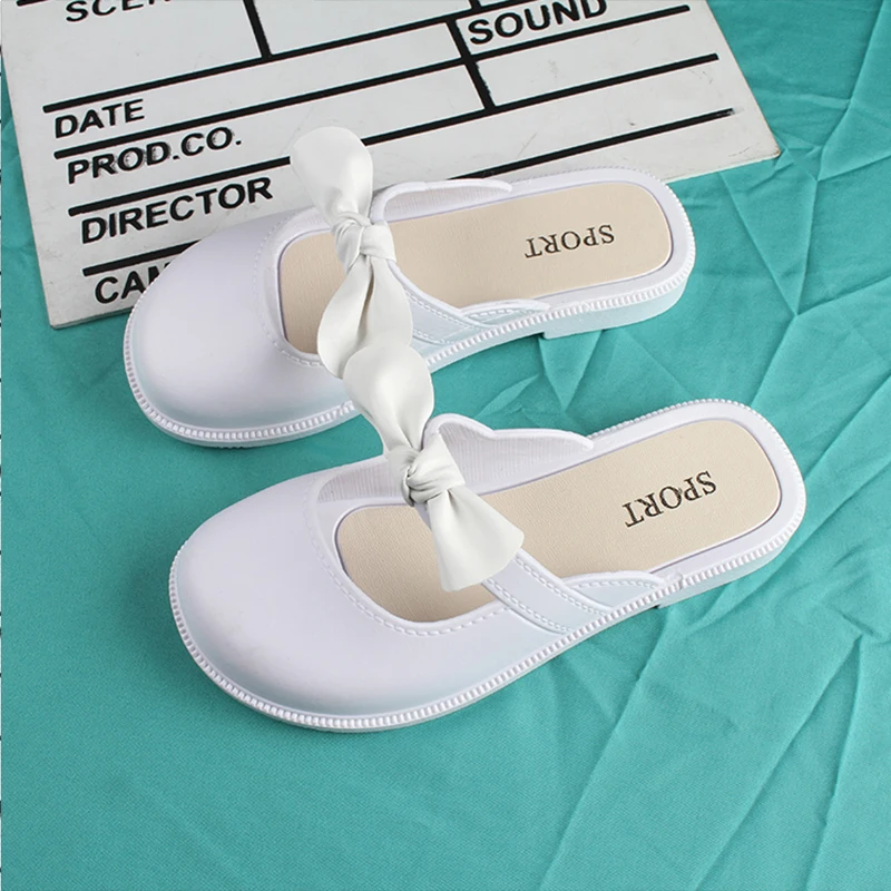 Children\'s New Summer PVC Little Girl Fashion Outside Wearing Solid Color Bow Half Drag Flat Sandals