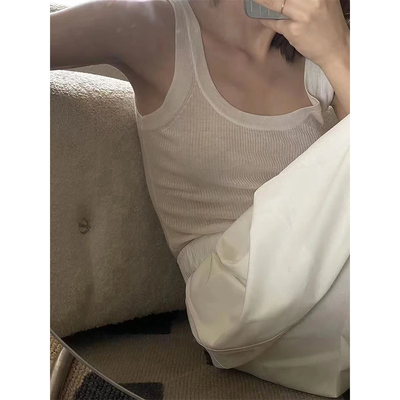 เสื้อเชือกแขวนคอ โดปามีนถักของผู้หญิงละลายน้ําได้ ขนสัตว์บริสุทธิ์ 100% ปั่นละเอียด แขนกุด หลังบางเฉียบและสวยงาม