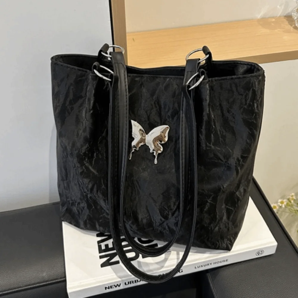 กระเป๋าถือหนัง PU ทันสมัย สไตล์เกาหลี สีพื้นเรียบง่าย กระเป๋าสะพายไหล่ลายผีเสื้อ กระเป๋าถือหรูหราสำหรับผู้หญิง