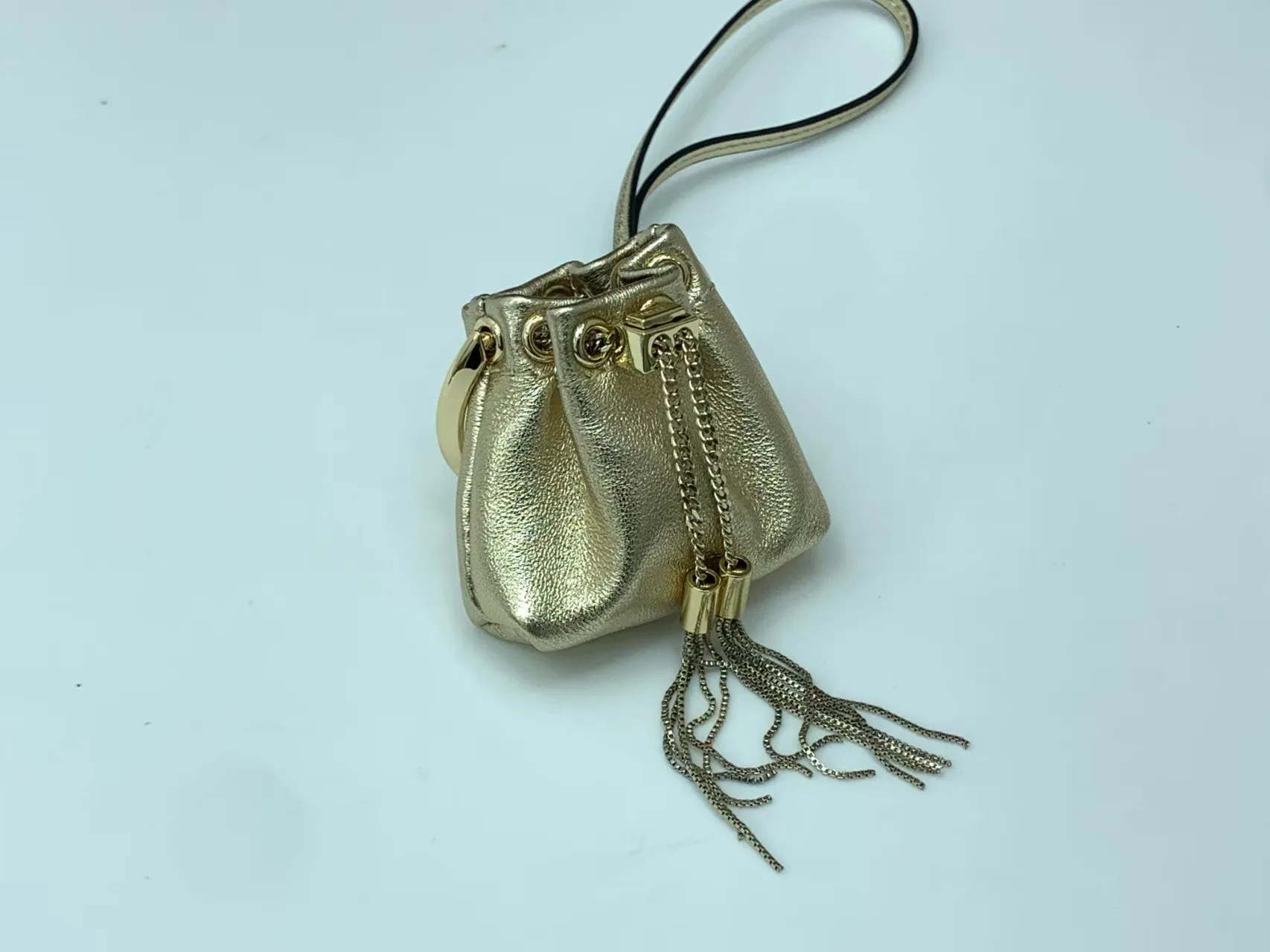 bolsa-mini-bucket-de-luxo-2026-de-designer-com-acessorio-de-berloques-em-couro