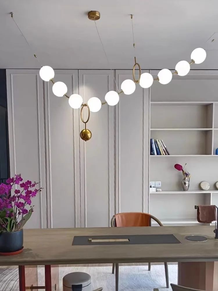 Magic beans, restaurant, French, chandelier, modern, minimalist, pearl, necklace, bar, dining table