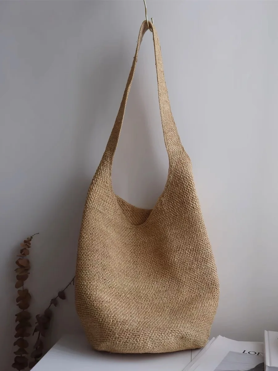 Moda wysokiej jakości ręcznie robiona torebka plażowa ze słomy rafii o dużej pojemności damska letnia drążona luksusowa designerska torba na ramię