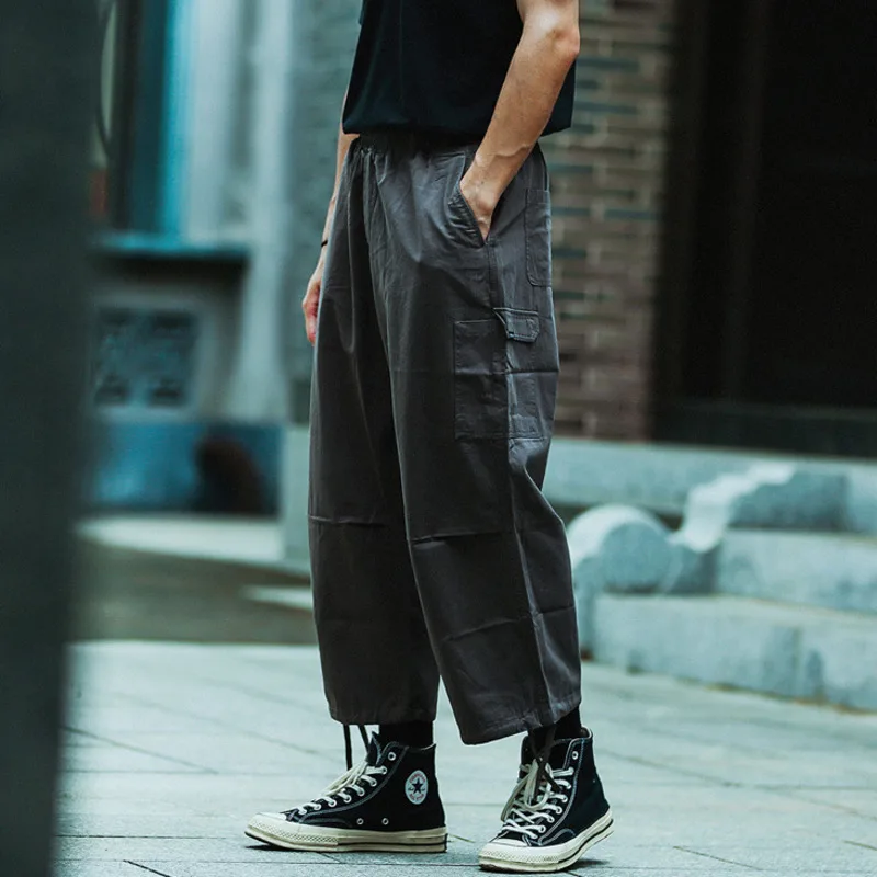 Men's spring and summer new fashion brand street loose cropped pants Japanese drawstring multi bag work pants casual pants