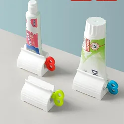 Dentifricio spremiagrumi supporto per dentifricio igiene orale strumenti per il bagno tubo cosmetici pressa detergente per il viso Dispenser per spremitura rotante