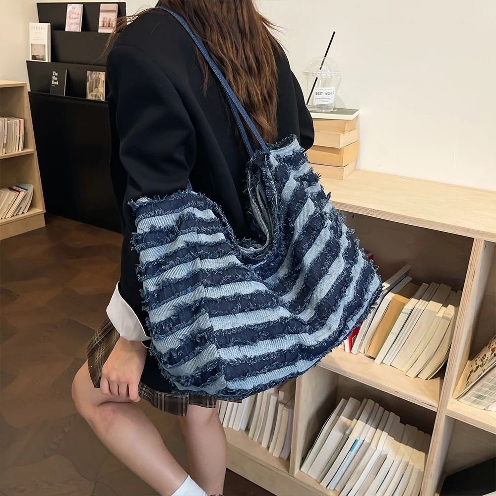 Lazy and casual striped denim bag with three-dimensional edge stitching technology for daily commuting and carrying