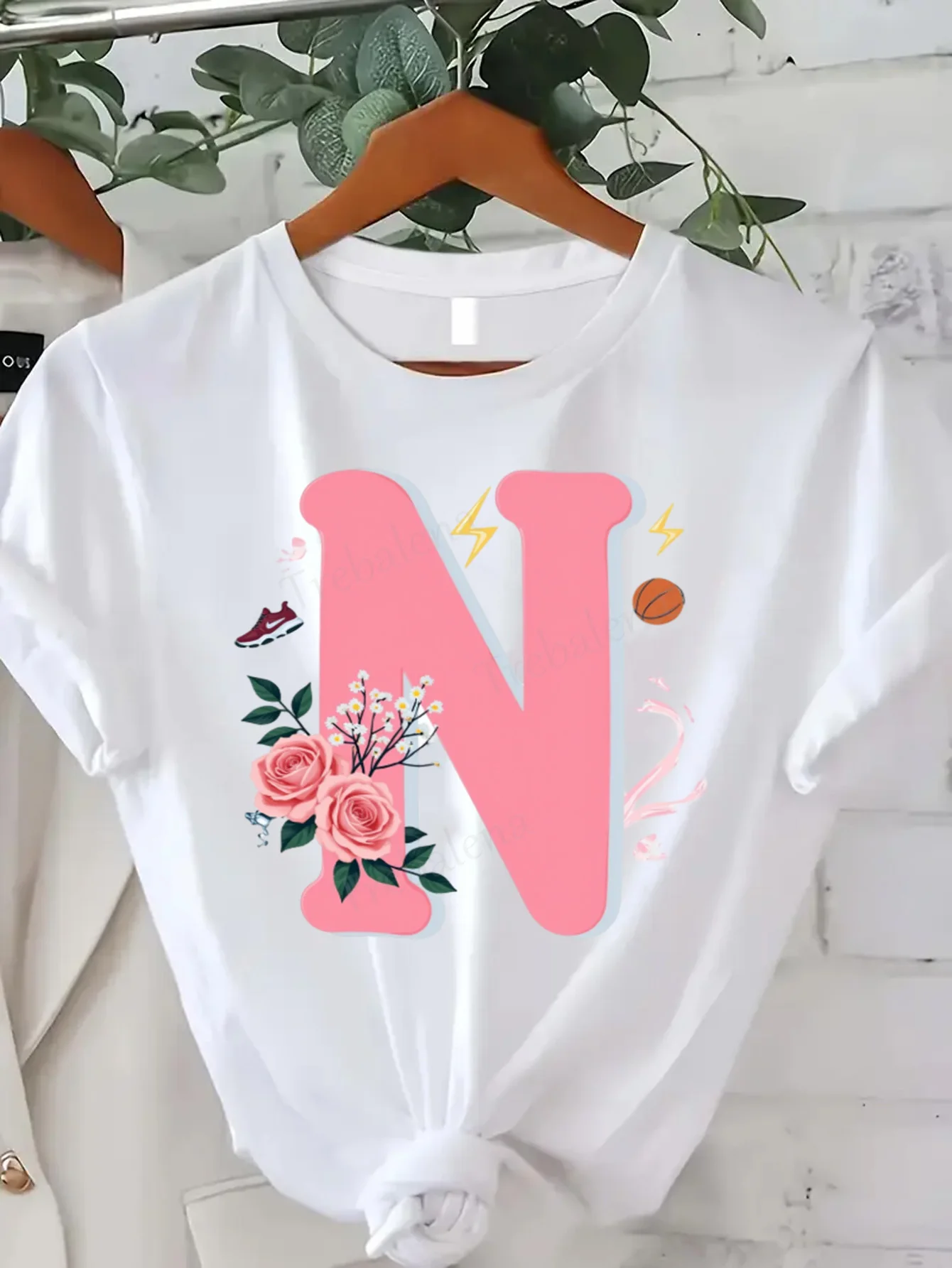 

Comfortable Women's Print T-shirt Cute Pink N Initial T-Shirt with Floral & Sports Design for Women