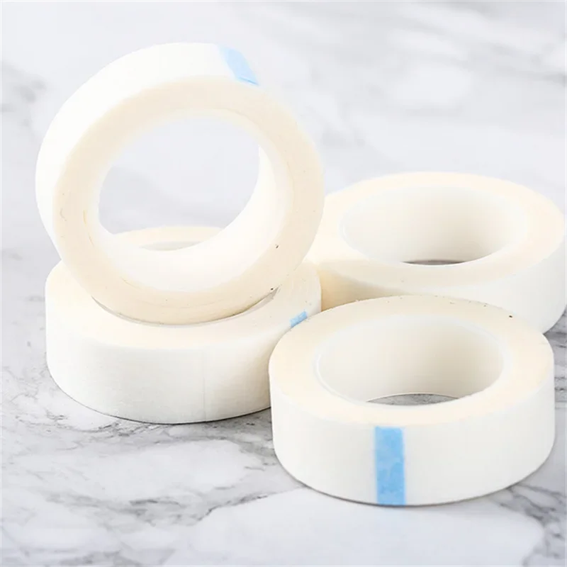 Cinta de papel para extensión de pestañas, cinta adhesiva de tela no tejida transpirable pelusa para parche de pestañas postizas, cinta de tatuaje