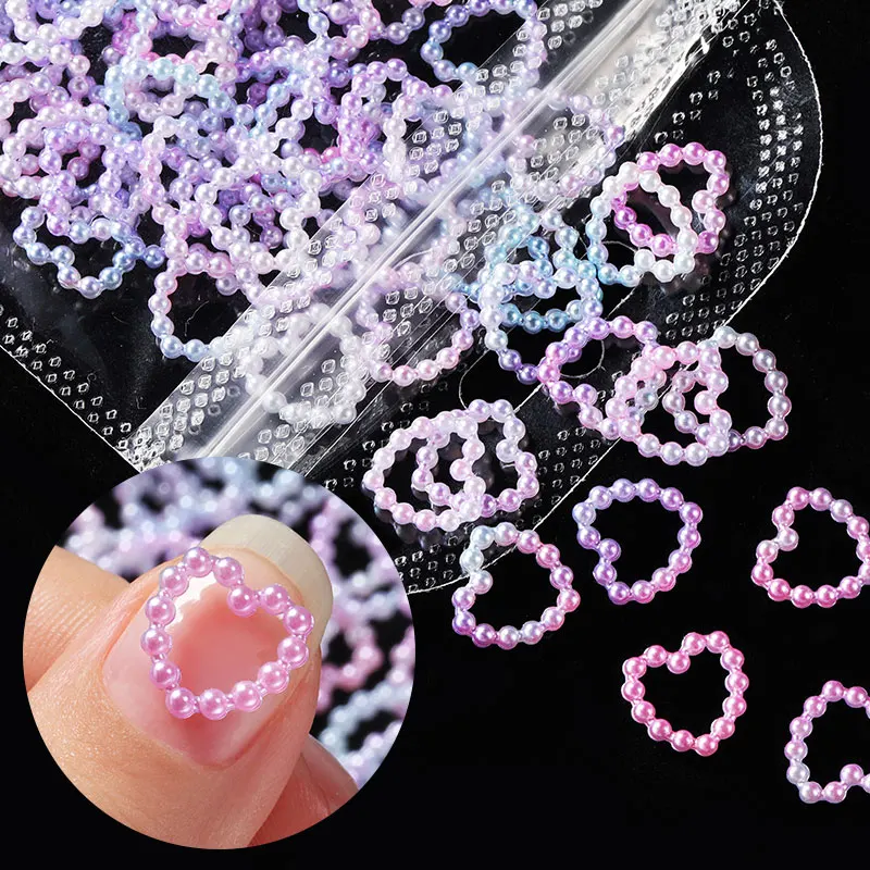 100 pz/borsa Hollow Heart Pearl Nail Art Charms bianco rosa viola perla rotonda Flatback 3D decorazione per unghie accessori per unghie fai da te
