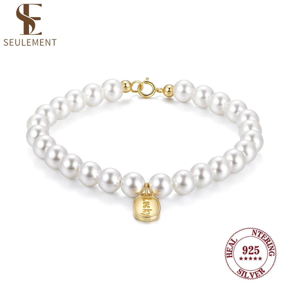 

Seulement 925 Sterling Silver Elegant Pearl Bracelet with Gold "Lucky" Charm Fashion Jewelry for Women Perfect Gift Accessories