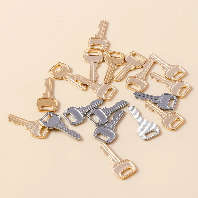Leslie - 20 Piezas de Dijes de Llave en Color Oro y Plata de 11*23mm para Joyería DIY, Collares, Colgantes Retro, Manualidades