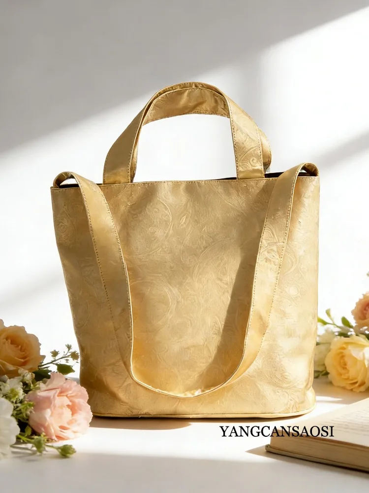 Borsa a secchiello in filato di nuvola profumata retrò cinese dal design di nicchia Nuova borsa da donna versatile di grande capacità di fascia alta