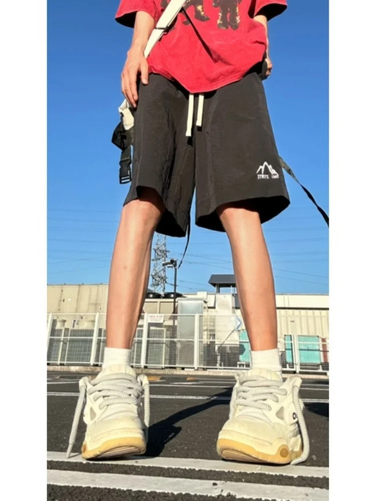 

Мужские шорты из ледяного шелка: летние, тонкие, повседневные, спортивные, длиной до колена, модные, брендовые, уличный стиль, с эластичным поясом, дышащие, легкие.