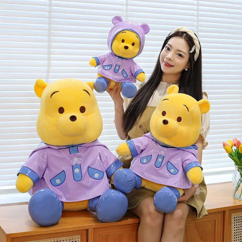 

Cute Plush Winnie the Pooh Bear in Raincoat with Hat Stuffed Animal Toy for Kids Birthday Xmas Gift Arcade Prize Wholesale