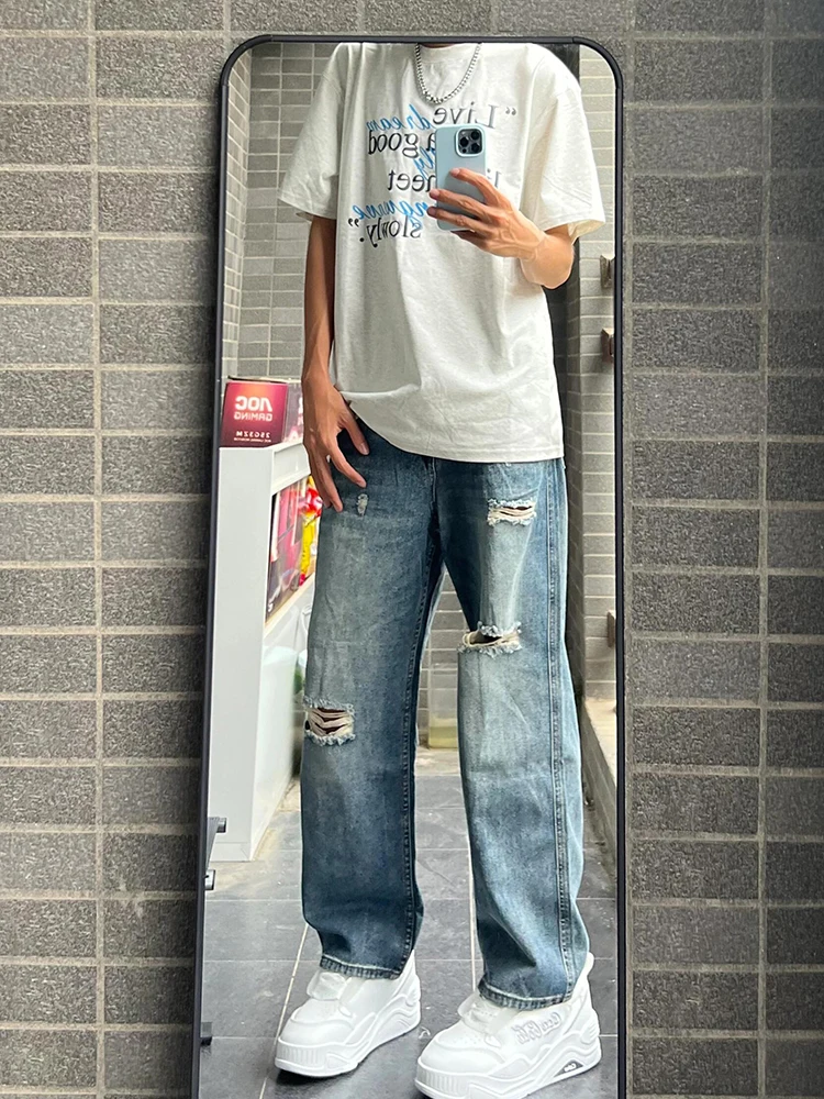 بنطلون جينز أزرق ممزق للرجال صيفي فضفاض مستقيم غير رسمي بنطلون طويل مغسول عتيق ملابس شبابية مقاومة للقطن والبوليستر