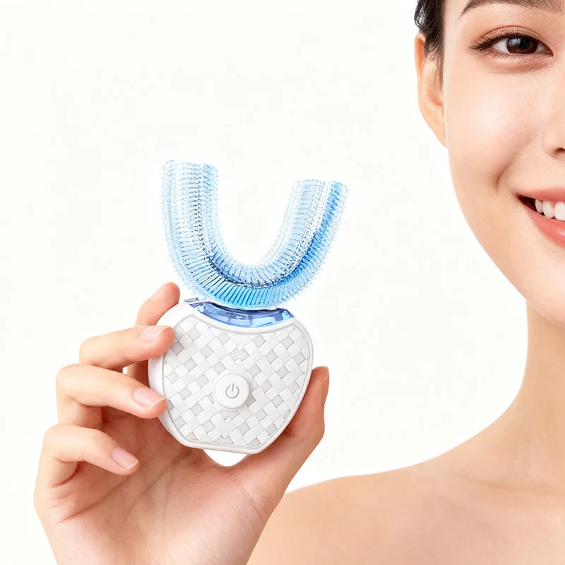 

U-shaped electric toothbrush with ultrasonic oral cleaner, featuring soft bristles and an adult whitening tool