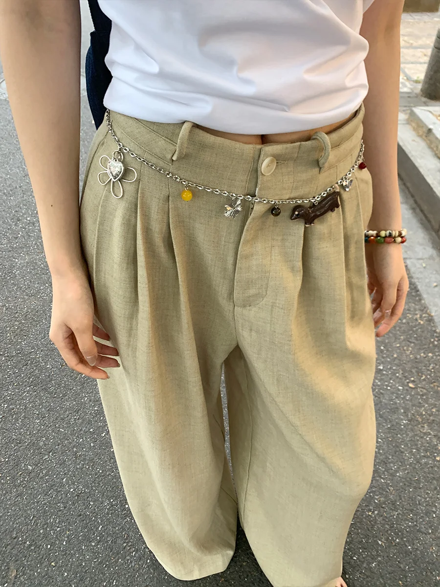 オリジナルデザインの花ソーセージ犬ウエストチェーン女性のためのニッチハイエンドロングペンダントネックレスとベルト