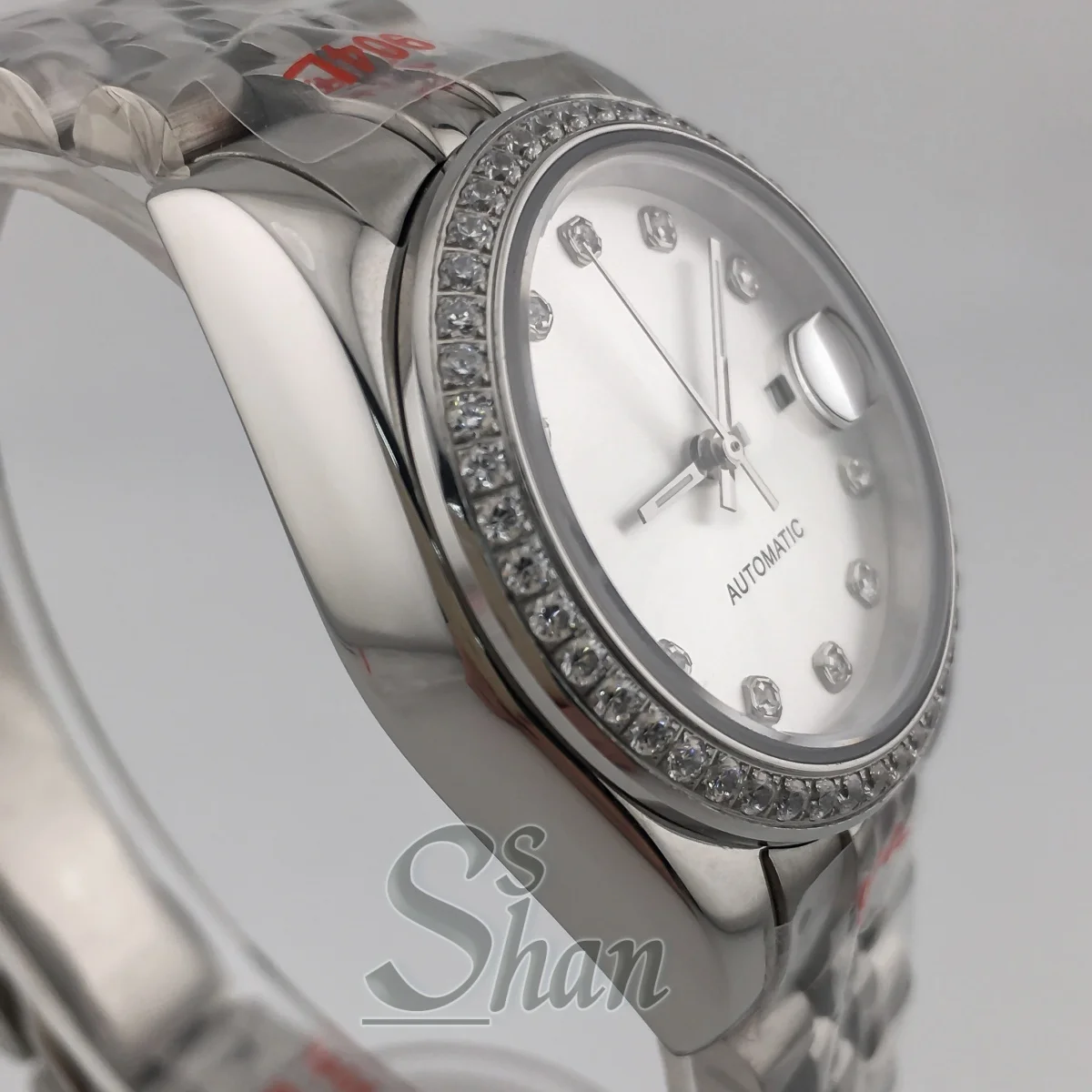 NH05 ファッショナブルな 31mm レディース自動巻き時計、ダイヤモンドベゼルとサファイアクリスタル、日光に晒されたホワイトパール文字盤、防水