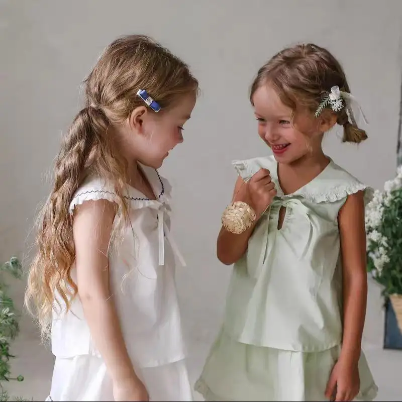 

2026 Summer New Girls Sleeveless T Shirts Baby Girl Cute Preppy Style Bow Tops Cotton Toddler Thin Princess Tops Kids Clothes