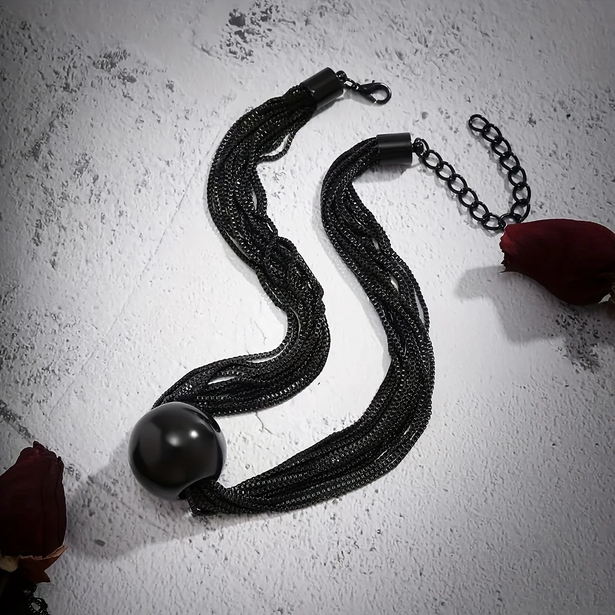 An exaggerated punk multi-layer chain overlaid with a personality necklace featuring a niche geometric sphere