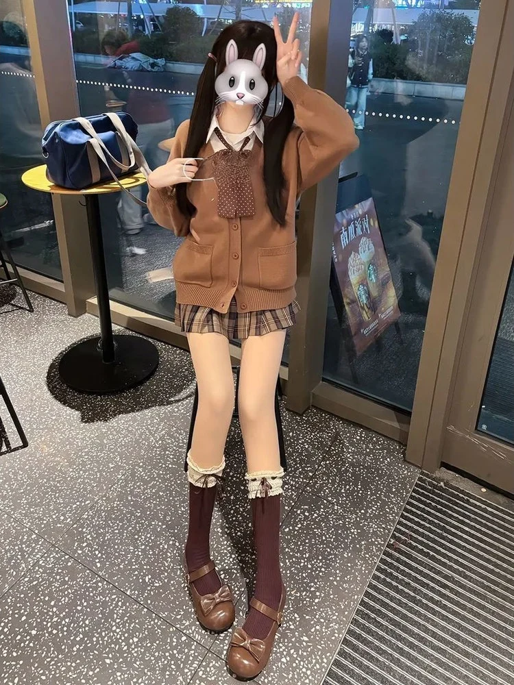 

Весенне-осенний вязаный orm Jk Свитер Тонкая верхняя одежда ort Юбка Одинаковый цвет Комплект Сахар Жареные каштаны Дизайн Колледж ...