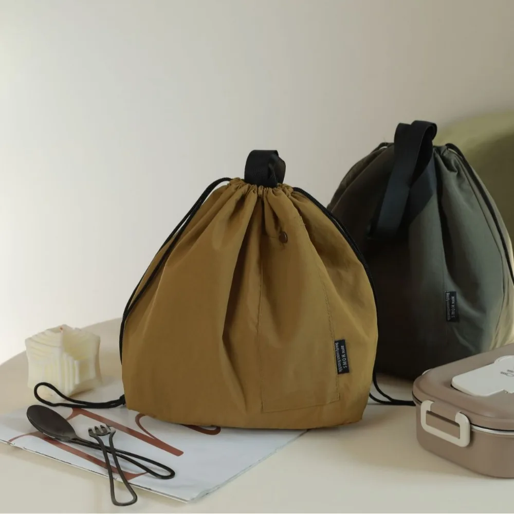 Durable Oxford cloth lunch box bag, simple solid color, office workers' picnic, insulated, draw-mouth hand-held lunch box bag