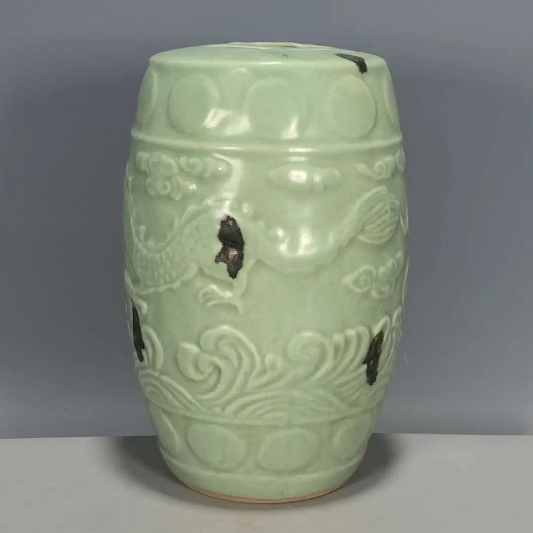 Song Dynasty Longquan Celadon Curio Drum Stool, Iron-Brown Speckle Flying Celadon Glaze, Moulded Dragon Relief Motifs