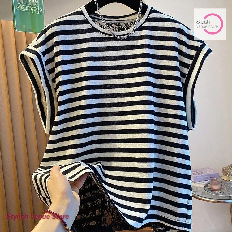 French stripe unique and chic backless T-shirt women's summer new loose lace stitching hollow design small flying sleeve top.