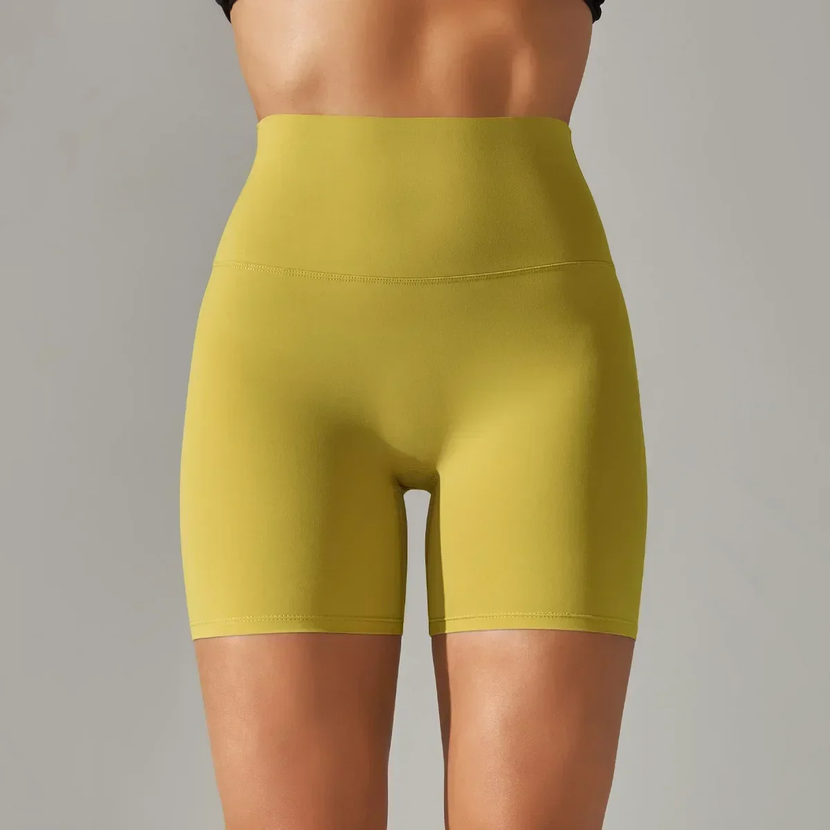 Nuevo estilo de pantalones cortos de Yoga para Fitness desnudos cepillados para mujer, pantalones de tres cuartos ajustados de cintura alta con cadera melocotón, correr ajustado