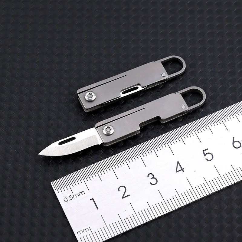 NEW Titanium alloy pocket sharp portable mini folding knife portable keychain pendant unboxing and unpacking courier knife