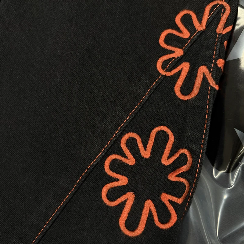 LOSTSHDWS jean tournesol détaillé ajouré broderie américaine haute rue Patchwork jambe droite Streetwear