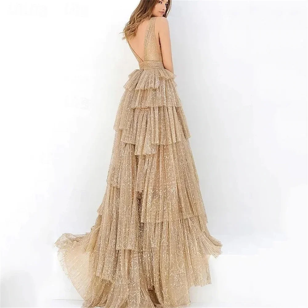 Abiti da ballo in tulle con paillettes scintillanti Scollo a V senza maniche con pieghe a strati Abiti lunghi a trapezio Abito da festa sexy senza schienale personalizzato