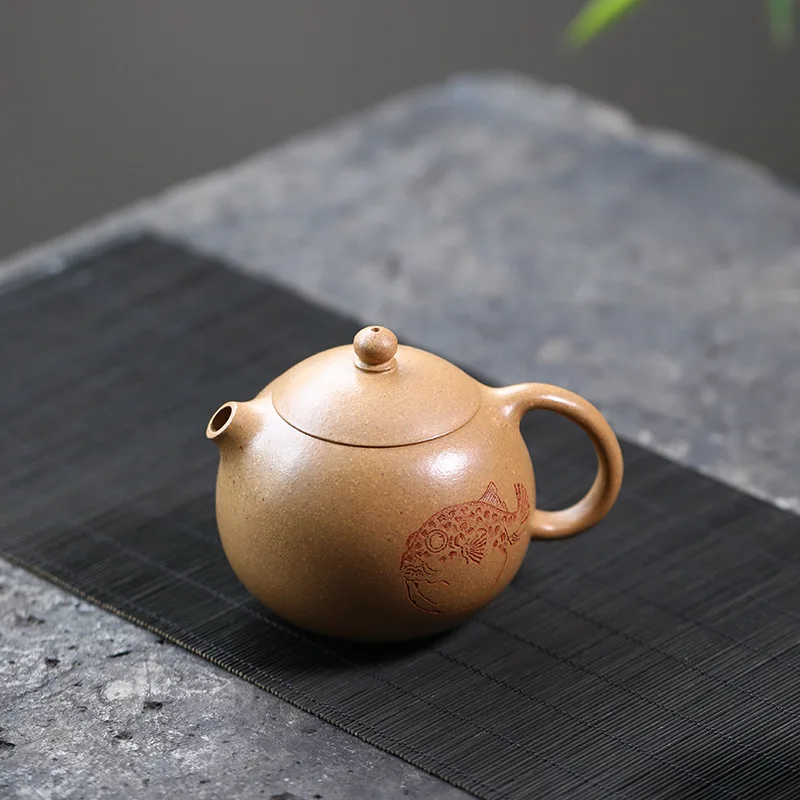 Xishi Purple Sand Pot Fan Qinjun Hand-Carved Puffer Teapot Heqi Yixing Segment Mud Kong Fu Tea Set