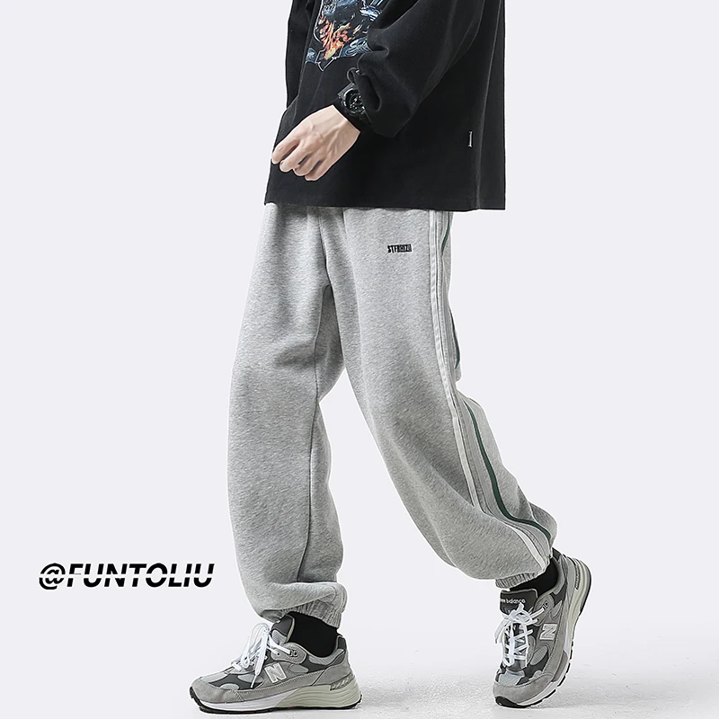 

Мужские повседневные спортивные брюки для весны и осени, свободные, с манжетами, с боковыми полосками, плотные, модные, широкие штаны