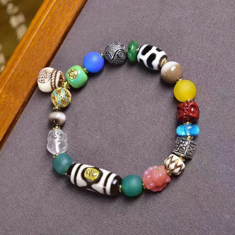 

Натуральный браслет из бусин, агат с одной петлей и одной линией из трехглазых бусин Дзи, акцентные бусины из киновари, в винтажном стиле.