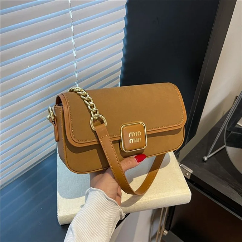 

Equestrian Inspired Saddle Bag For Women Stylish Leather Crossbody With Curved Design Equestrian Detail