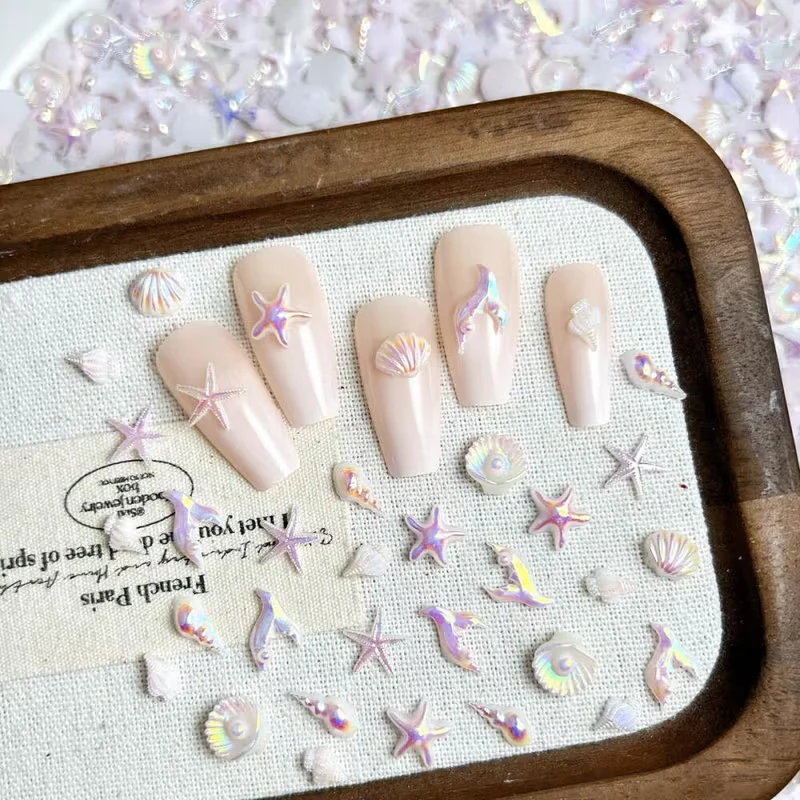 Mini Ocean Series Nail Art Decorations: Shells, Starfish, and Dolphins (DIY Phone Case Decor) – Styles Colors Random（1/100pcs）