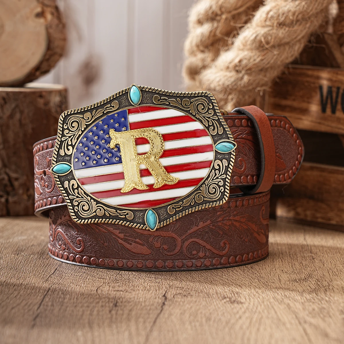 A western cowboy-style belt with letter embossed buckle and PU leather with embossed pattern. American retro style