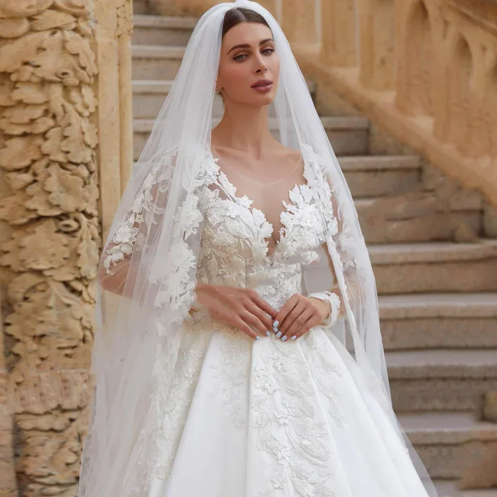 فساتين زفاف أنيقة مخصصة من الساتان مزينة بالدانتيل وأكمام طويلة ورقبة سكوب وأزرار خلفية على شكل حرف A فستان العروس فيستدوس دي نوفيا