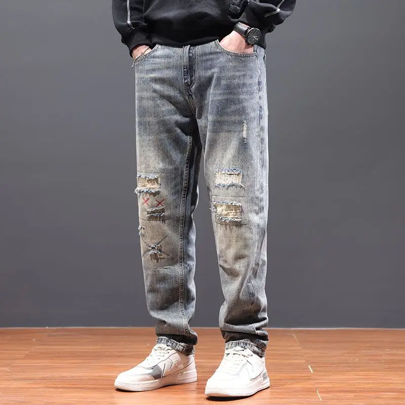 

men's loose fitting straight ripped autumn torn patch beggar jeans men's casual and personalized men's pants ripped jeans