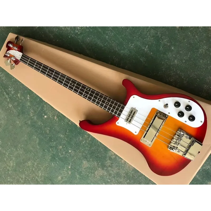 Orange body 4strings Electric Bass Guitar , Rosewood fingerboard ,Chrome Hardware ,Dots inlay