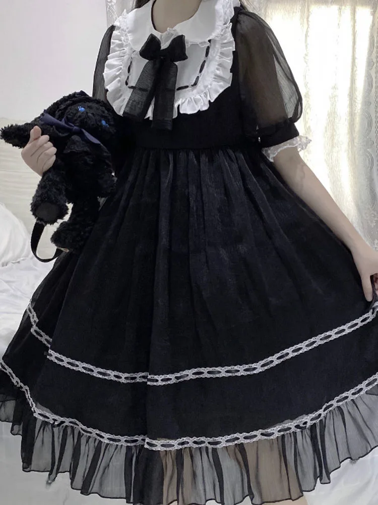 

KIMOKOKM Lovely Lolita Style Princess Lace Cosplay Dress Peter Pan Collar Bow Ruffles Lace Puff Sleeve Sweet Solid Color Dress