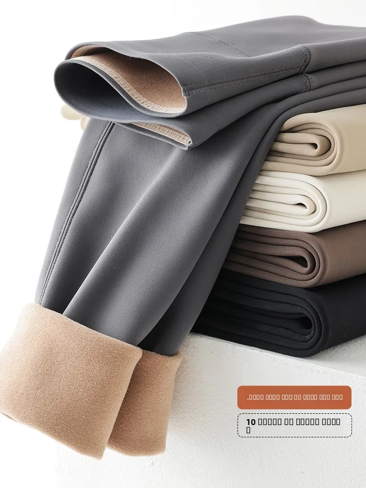 Damskie spodnie do jogi z wysokim stanem, ocieplane, modelujące sylwetkę, białe, jesienno-zimowe, termiczne, wyszczuplające brzuch, warstwa bazowa.